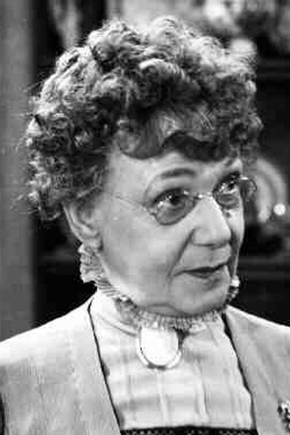 Jean Adair as Aunt Martha Brewster