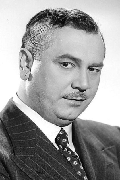 John Alexander as 'Teddy Roosevelt' Brewster