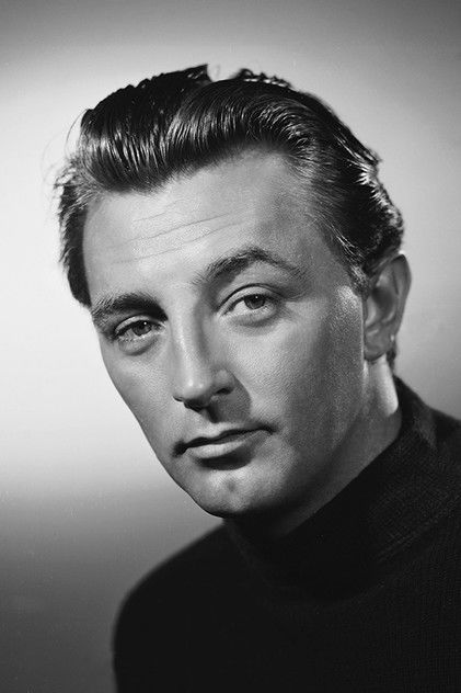 Robert Mitchum as Charles Delacro